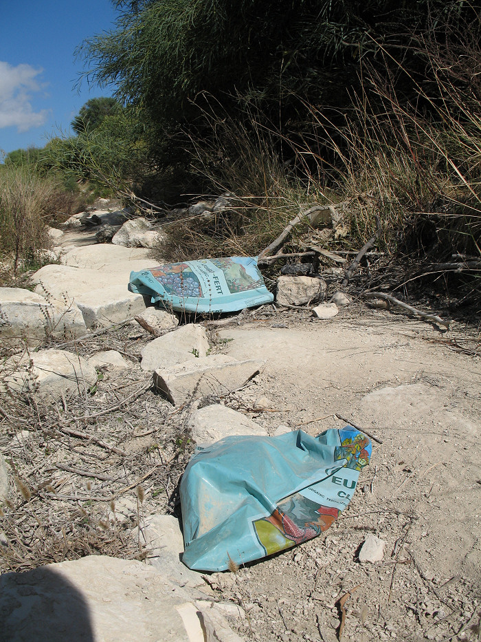 Fertilzer Plastics bags dumped in Mgiebah Valley most probably from fields lining the valley bed.
